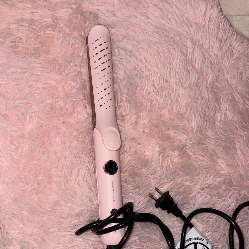 Pink cooling curling iron